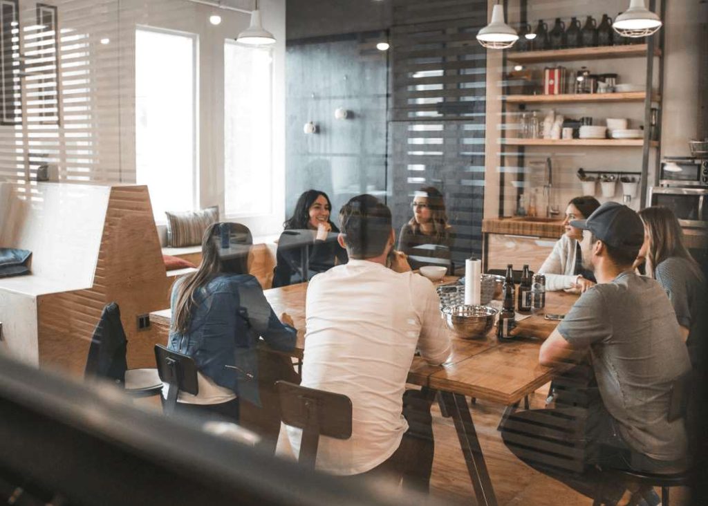 Creative team developing brand identity materials for sustainable dropshipping business