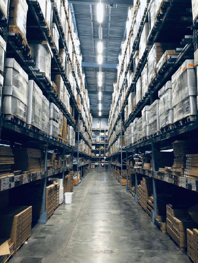 Modern warehouse with packages ready for dropshipping fulfillment and worldwide delivery